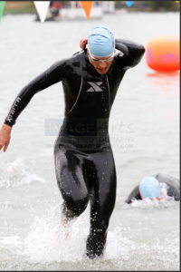 Swim finish, were I gloriously pose while trying to open my wet suit :-)